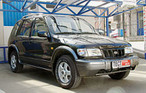 Kia Sportage -  Chevrolet Niva